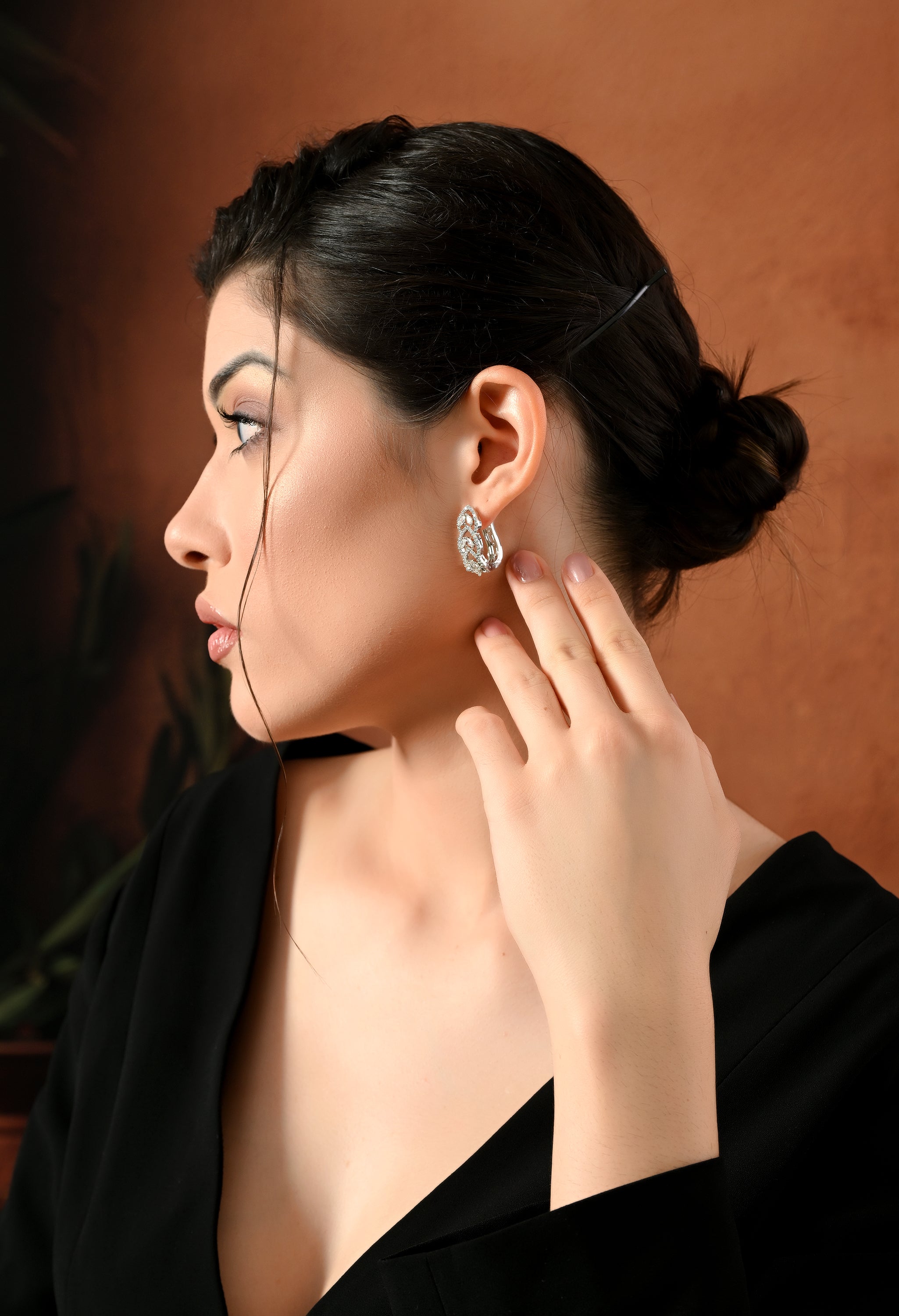 Gleaming Silver Leaf Studs