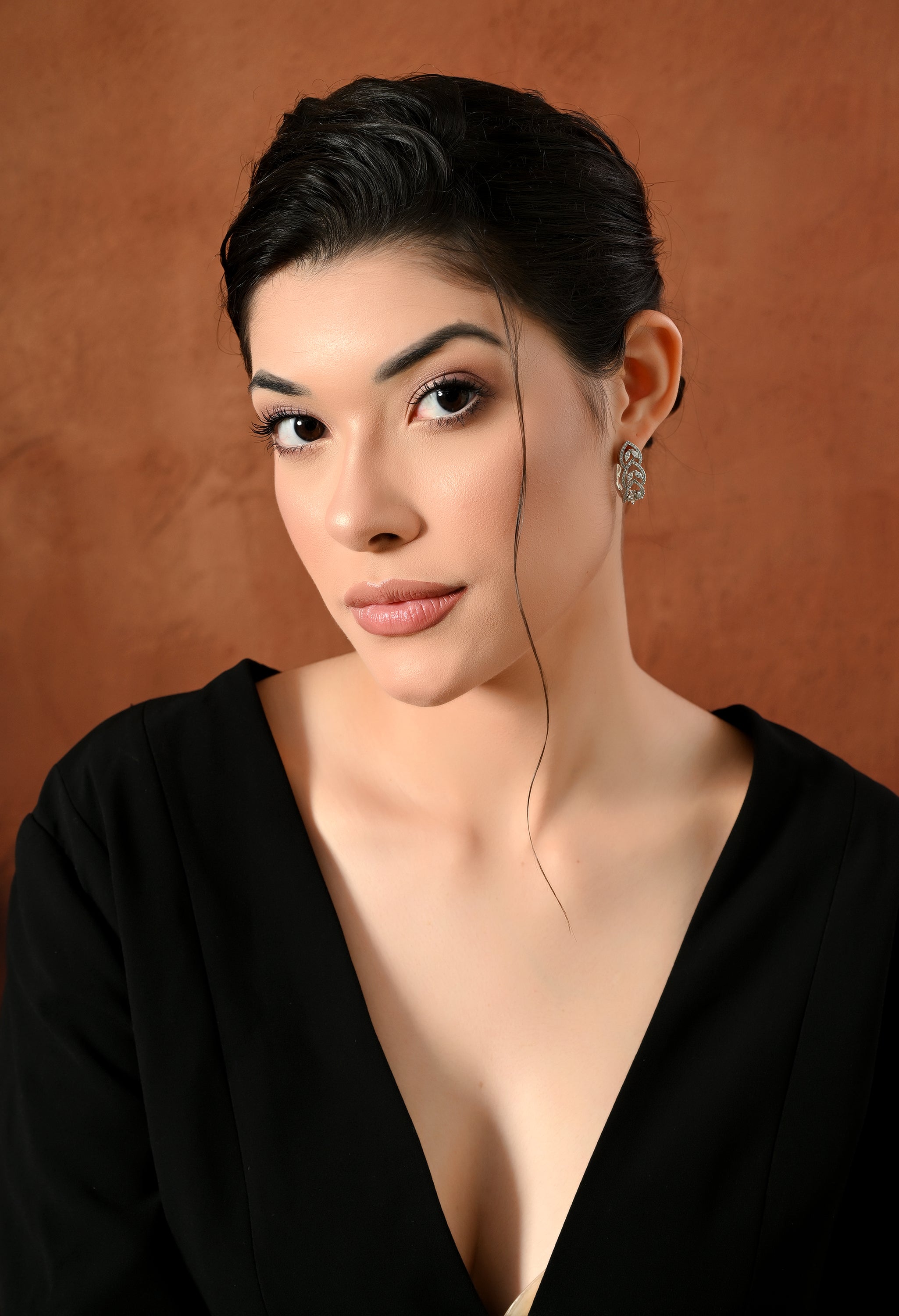 Gleaming Silver Leaf Studs