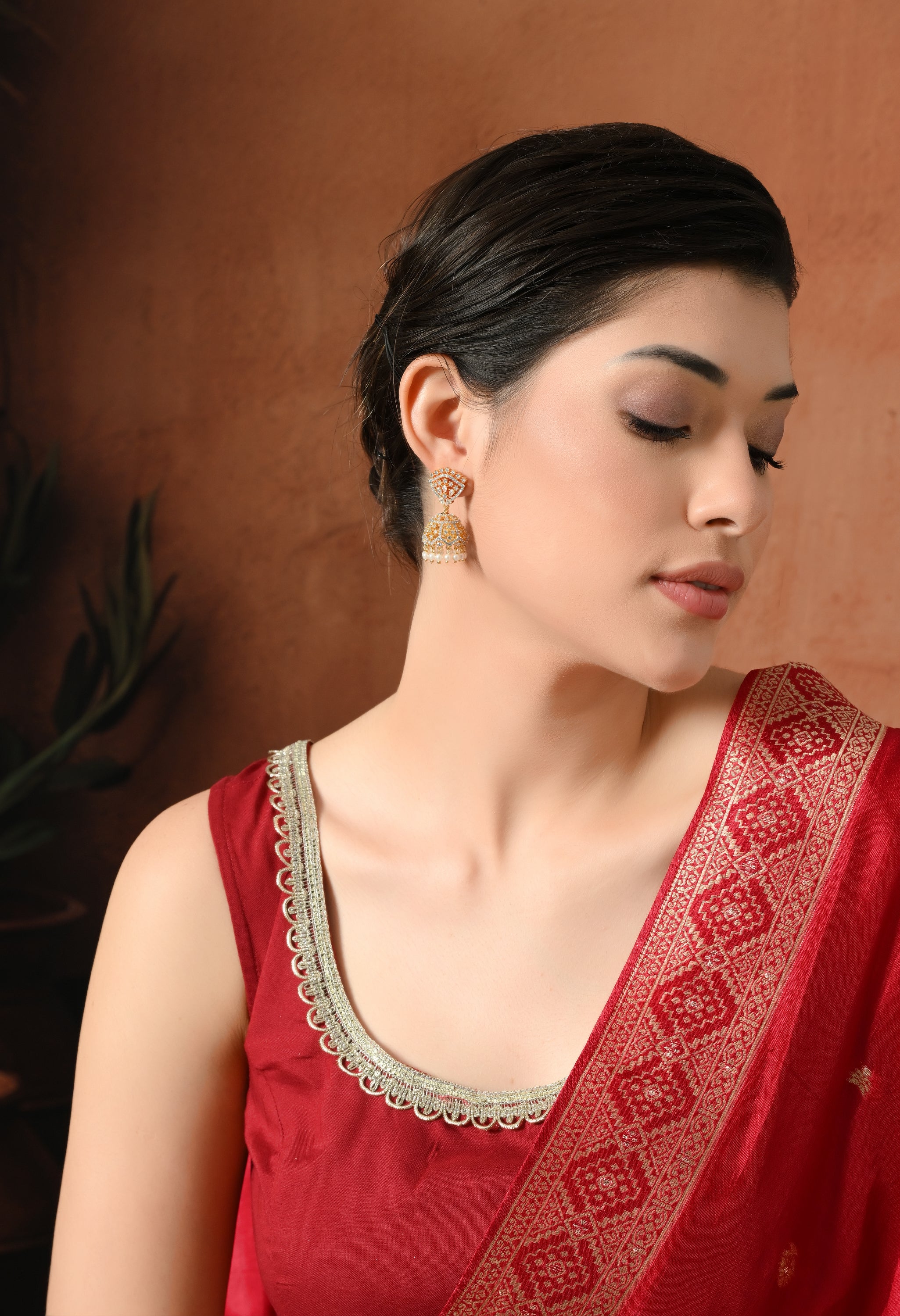Royal Glow Golden Jhumka Earrings