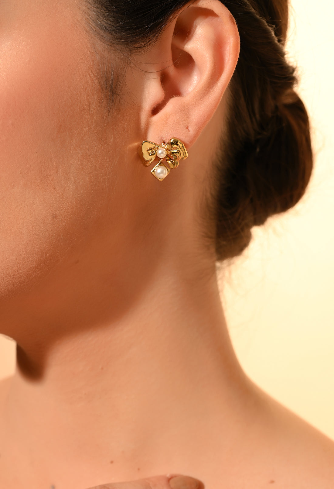 Golden Bow Pearl Stud Earrings