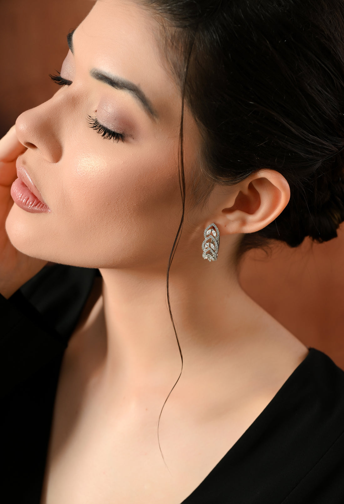 Gleaming Silver Leaf Studs