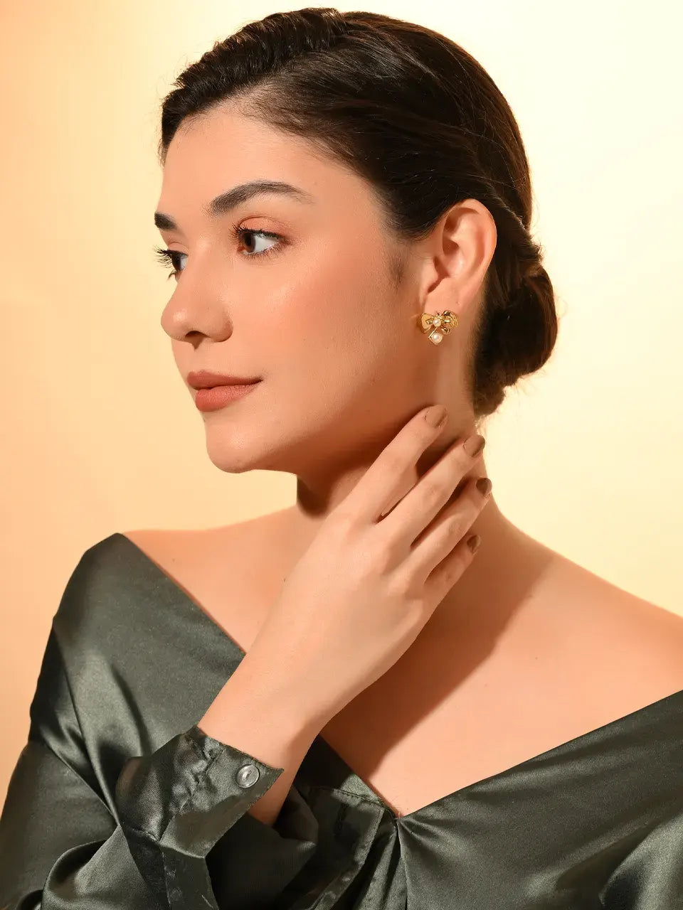 Golden Bow Pearl Stud Earrings